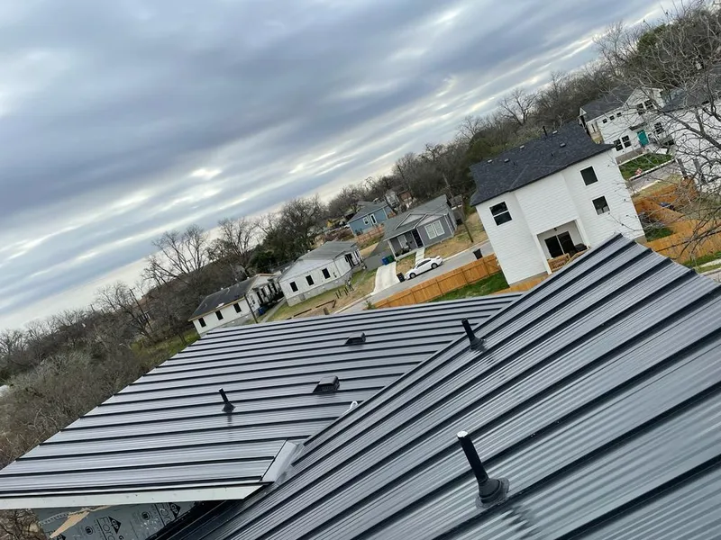 Standing seam metal roof panels with vents for Skylight Repair in Romeoville